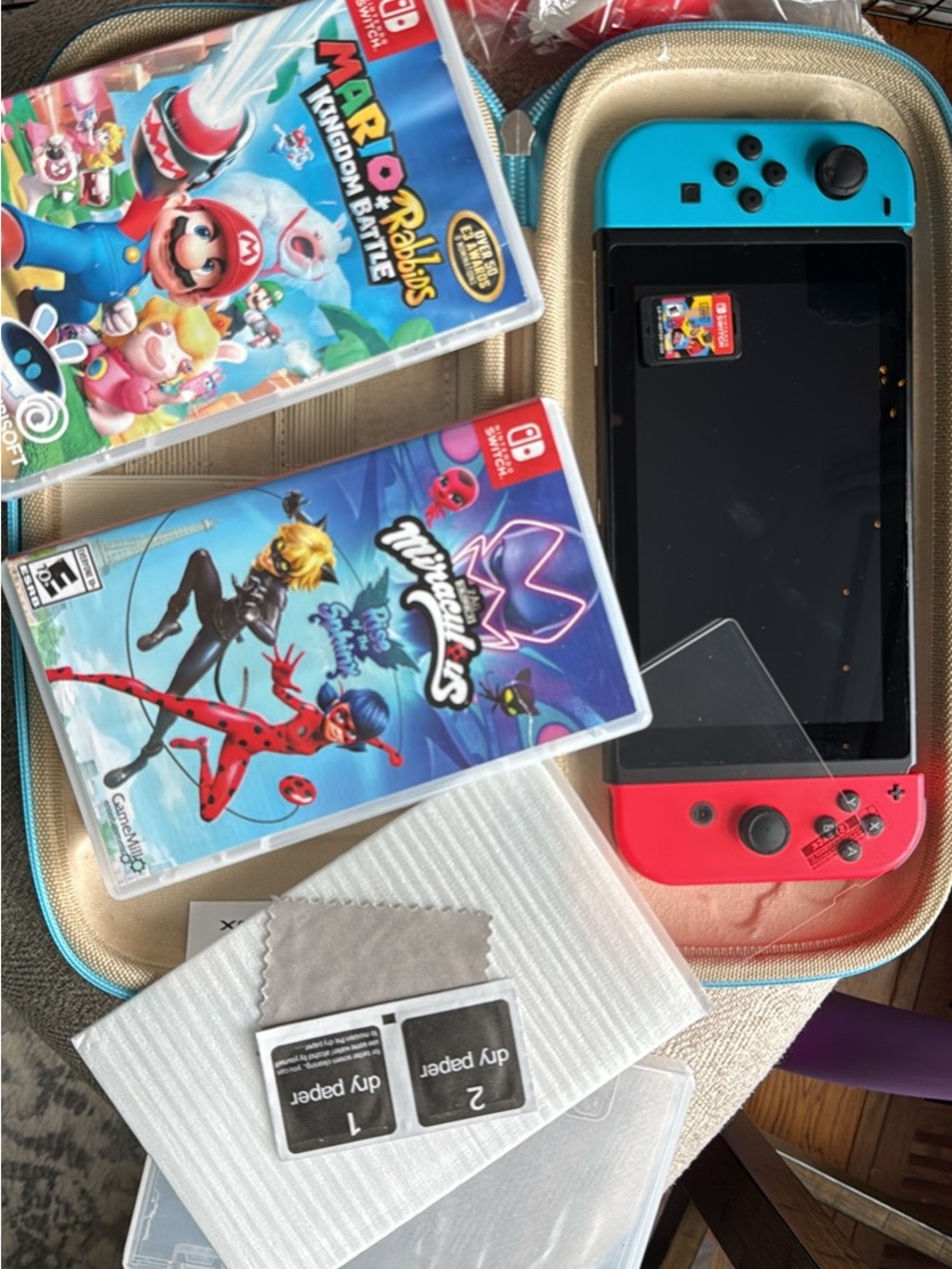 Nintendo Switch Console BUNDLE (case and Miraculous and Mario + rabits)